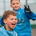 Youngsters playing football